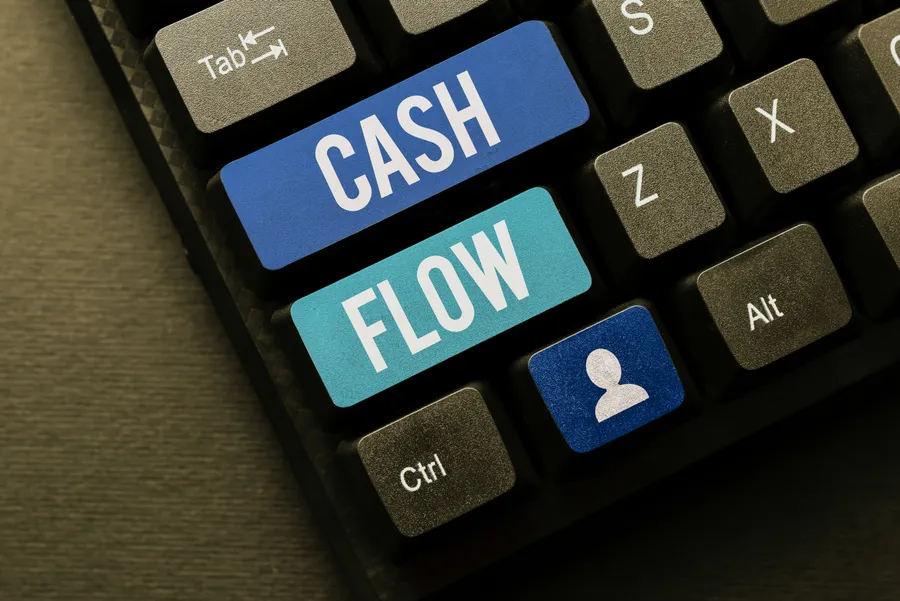 Keyboard with blue and teal keys labelled Cash and Flow