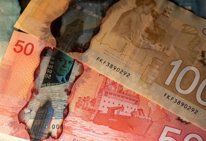 Close-up of overlapping Canadian banknotes