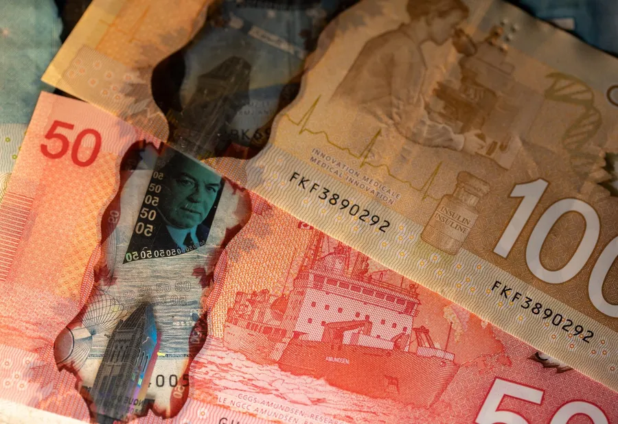 Close-up of overlapping Canadian banknotes