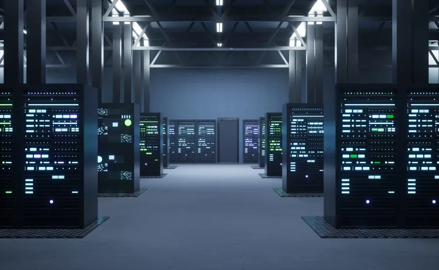 Rows of illuminated server racks in a data centre