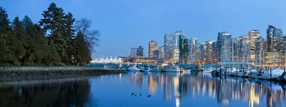Vancouver waterfront skyline and marina at dusk